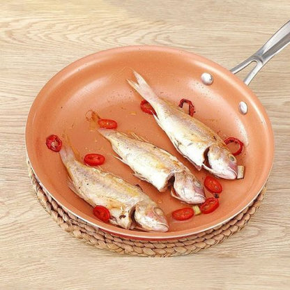 poele-a-frire-couleur-cuivre-poisson